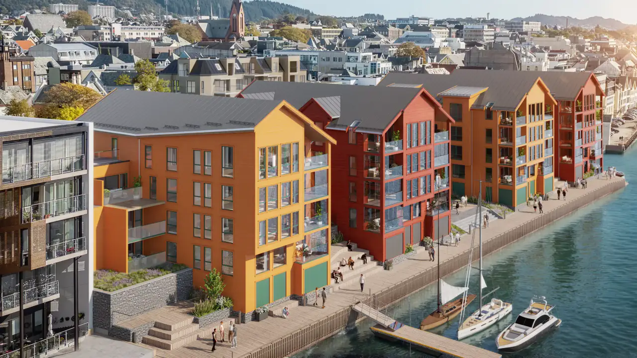 Leilighetsprosjektet Sentrum-Brygge visualisert langs kaia, med båthavn og by i bakgrunnen