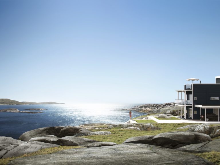 et svart hus ligger på toppen av en høyde med utsikt over havet.