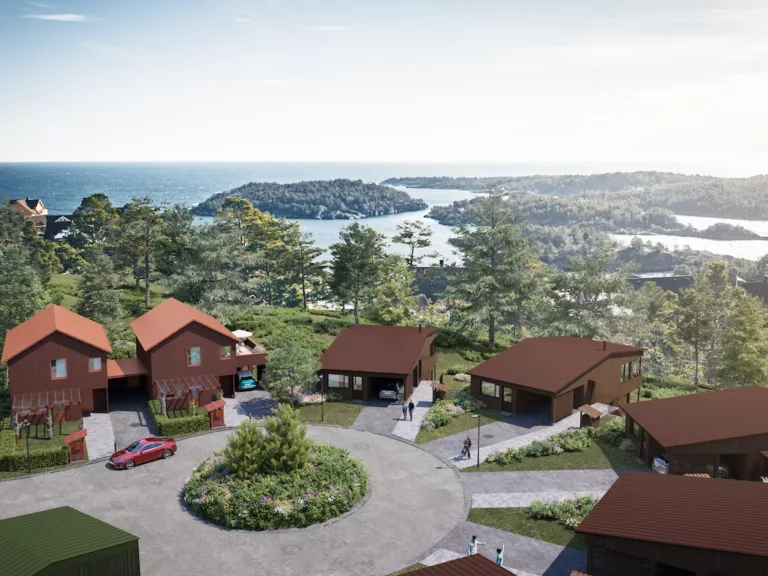 En gjengivelse av et boligområde med utsikt over havet.